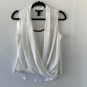 Sleeveless white blouse size small.